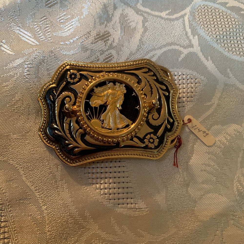 Walking liberty belt buckle